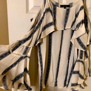 Cold shoulder bell sleeve top